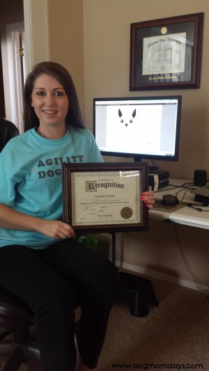 Me with my certificate of recognition for being a finalist in the Best New Pet blog category.
